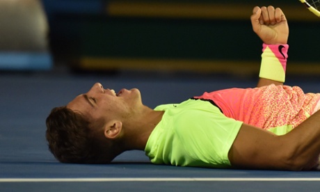Thanasi Kokkinakis post head-stand. Photo: Paul Crock/AFP/Getty Images