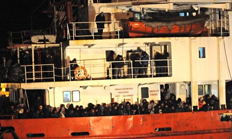 The Blue Sky M cargo ship, carrying an estimated 900 migrants, at Gallipoli harbour, southern Italy