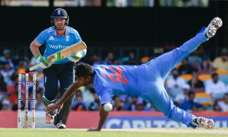 Ian Bell drives a delivery past bowler Stuart Binny