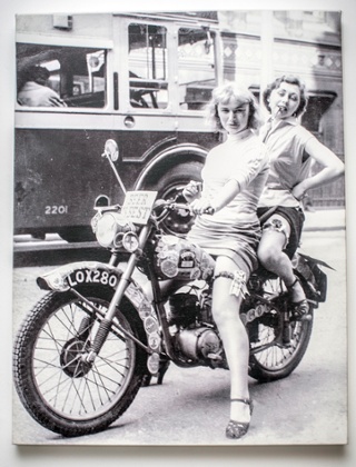 Daisy Jacobs' grandmother Eileen, left, with a friend on a motor bike, circa 1950.