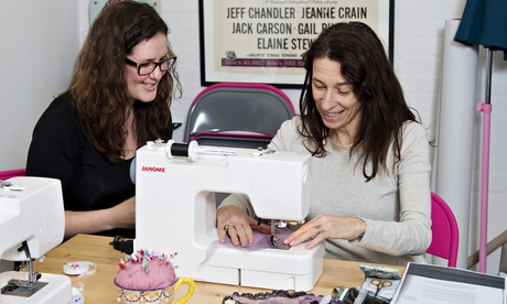 Emma Cook (right) is taught how to sew a pair of knickers by Laura Stanford.