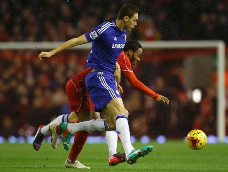 Nemanja Matic challenges Raheem Sterling.