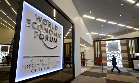 A man enters the Congress Center in Davos