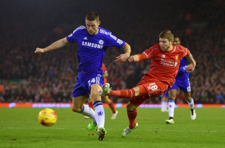 Alberto Moreno is challenged by Gary Cahill.