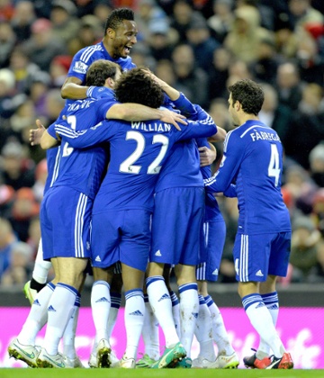 Eden Hazard is congratulated by his team mates.