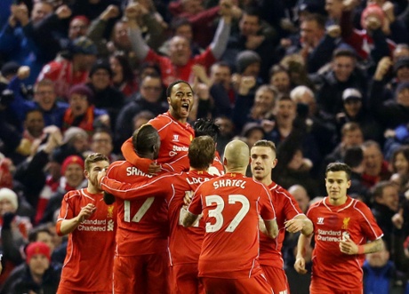 Raheem Sterling celebrates his goal with team mates.