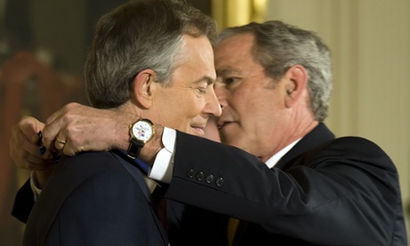 George Bush awards Tony Blair the Presidential Medal of Freedom at the White House in January 2009.