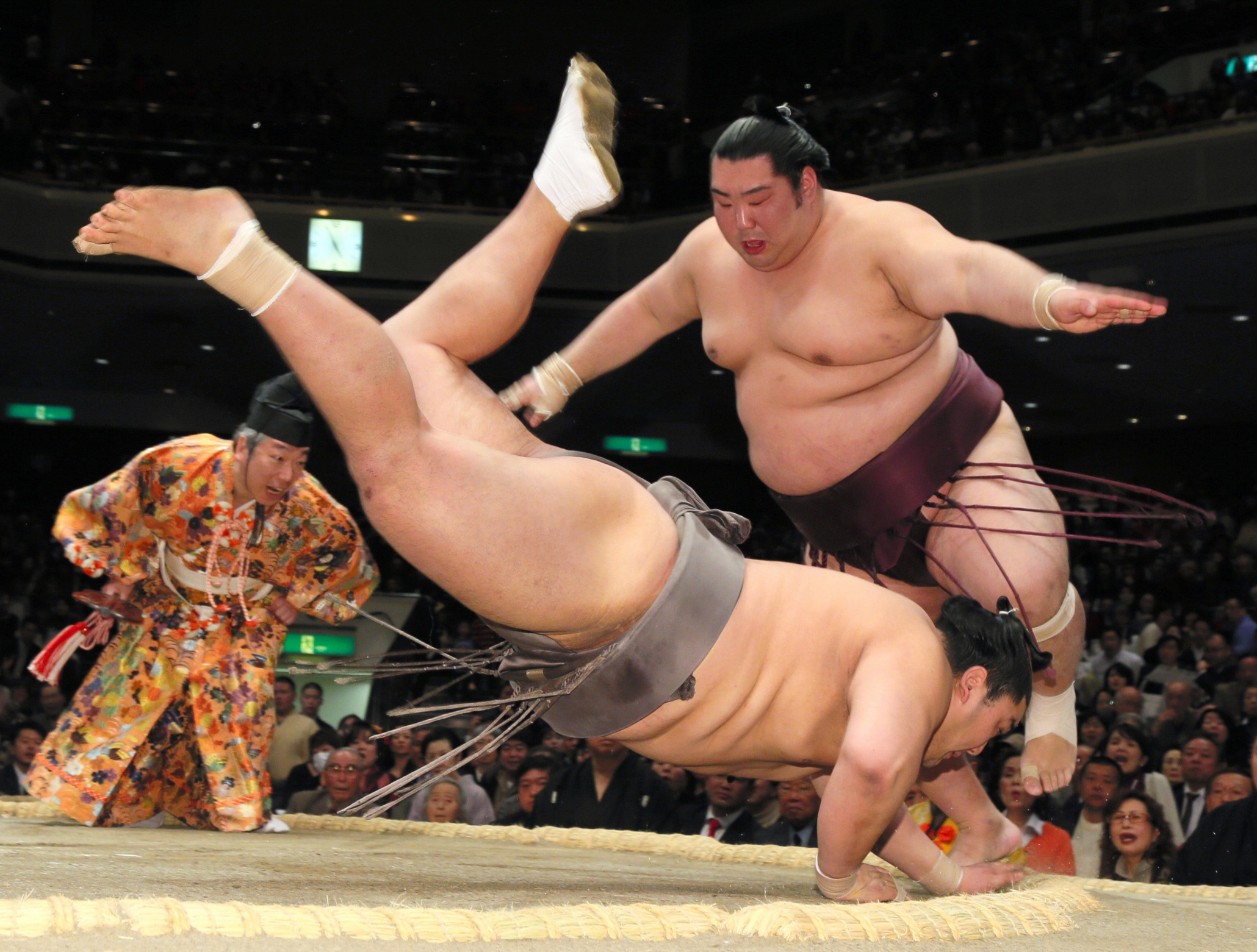 Sumo wrestlers needs to be strong, agile and able to use their power to ove...