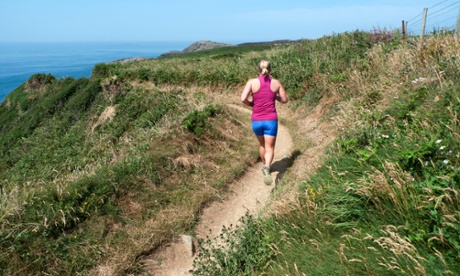 Runner on the Pembrokeshire Coast Path in Wales