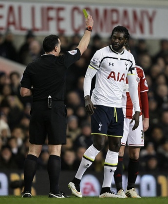 Emmanuel Adebayor gets a yellow.