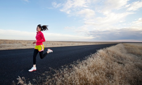 Woman running on road