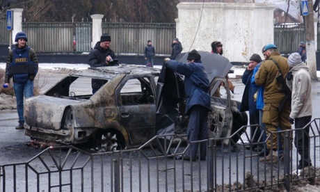 A burnt vehicle seen after it was hit by a shell in Donetsk, Ukraine.