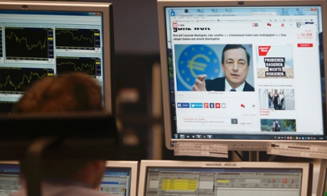 A trader in Frankfurt watches Draghi. Photo: Reuters/Ralph Orlowski.