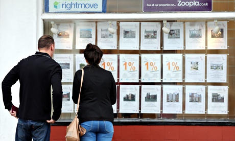 A couple looking at homes for sale