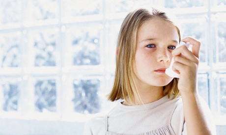 Young girl with inhaler