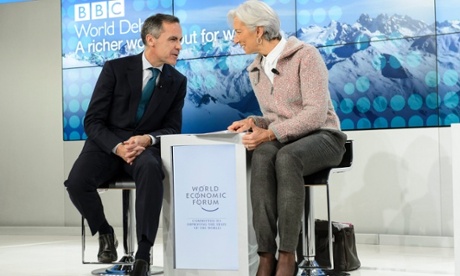 Mark Carney, governor of the Bank of England, and  Christine Lagarde, head of the IMF, at a panel session of the World Economic Forum, in Davos, Switzerland.