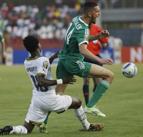 Ghana’s Daniel Amartey of Ghana tries to stop Bentaleb’s run.