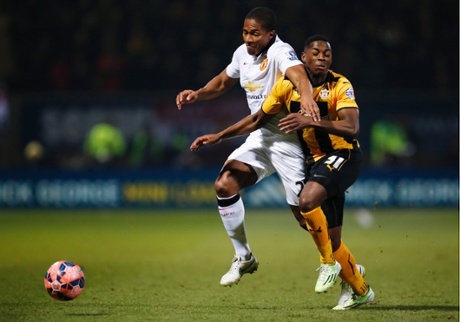 Antonio Valencia puts his body in the way of the impressive Sullay Kaikai.