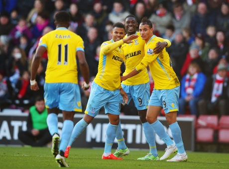 Marouane Chamakh, right, celebrates his strike with  Fraizer Campbell, second left, and Yaya Sanogo, as Wilfried Zaha comes over to join the group hug.