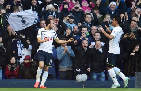 Townsend is congratulated by teammate Paulinho as the Spurs faithful celebrate in the stands.