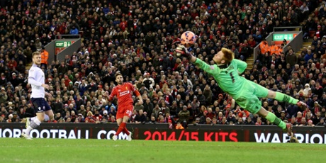 Bolton's Adam Bogdan makes a fantastic flying save from Fabio Borini.