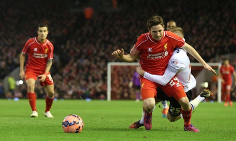 Joe Allen is wrestled to the ground by Josh Vela.