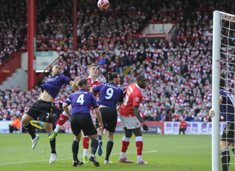 Matt Smith heads towards goal.