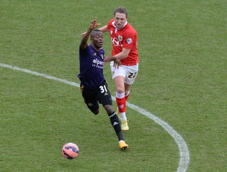 Enner Valencia beats Luke Ayling to the ball.