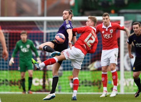 George Saville challenges West Ham United's Andy Carroll.