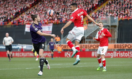 Derrick Williams heads the ball directly into Andy Carroll