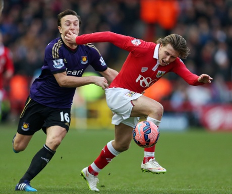 Luke Freeman pulled back by Mark Noble.