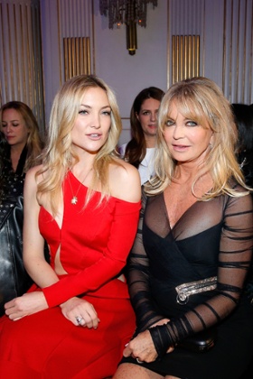 Kate Hudson and Goldie Hawn attend the Versace show.