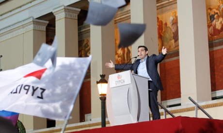Leader of Syriza left-wing party Alexis Tsipras reacts as his supporters gather outside Athens University Headquarters in Athens last night.