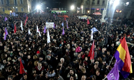 Syriza supporters celebrate in front of the Athens University after the announcement of the winning result in the Greek elections