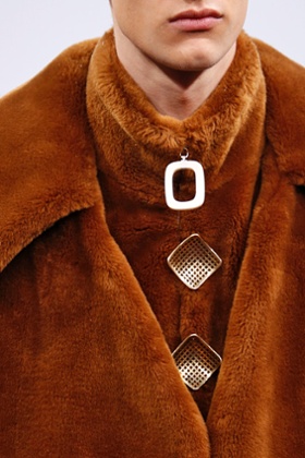 Brooch-like buttons at Jw Anderson