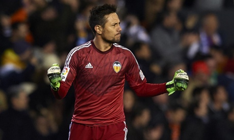 Valencia's Diego Alves celebrates after yet another penalty stop in a heated game against Sevilla in La Liga.