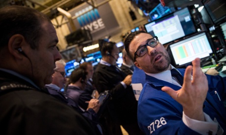 Traders at the New York Stock Exchange. Photo: Andrew Burton/Getty Images.