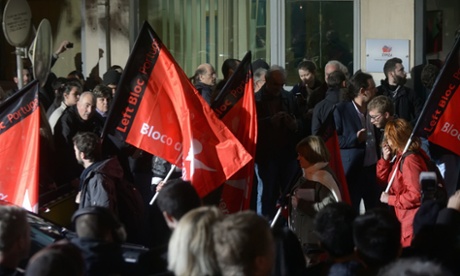 Supporters of Portugal's anti-austerity Left Bloc wait for results from the Greek election.