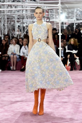 A model walks the runway during the Christian Dior haute couture show in Paris displaying the collection by Raf Simons.