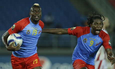 DR Congo's Loteteka Jeremy Bokila celebrates with teammate Diedonnei Mbokani after scoring the equaliser.