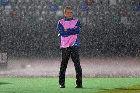 Cape Verde's coach Rui Aguas watches the game against Zambia in the rain at Ebebiyin. Both sides failed to progress after a goalless draw.