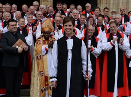 Libby Lane (front) is applauded by other clergymen in front of York Minster.