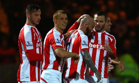 Stephen Ireland celebrates with his team-mates after scoring the second.