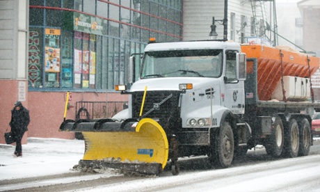 A Jersey City Incinerator Authority salt and plow truck is seen at Newark Avenue