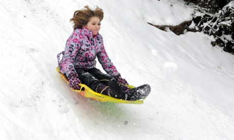 Faith Houser of Pottsville, Pa., flies down a snowy hill at General George A. Joulwan East Side Park in Pottsville, Monday,