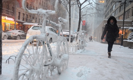 Snow-covered bicycles lining the streets of Manhattan’s Upper East Side show that most cyclists have wisely stayed on foot or indoors due to the heavy snowfall.