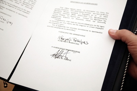 The signature of newly apointed Greek Prime Minister Alexis Tsipras of the Syriza party is seen on an assurance protocol after a swearing in ceremony at the Presidential Palace in Athens on January 26, 2015.