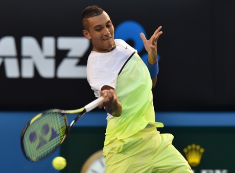 Nick Kyrgios plays a shot.