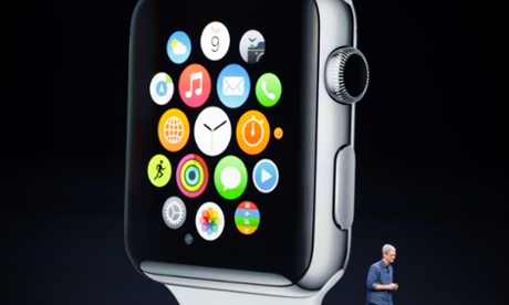 Tim Cook reveals the Apple Watch on stage.