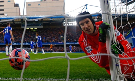 Goalkeeper Petr Cech looks on after being beaten by a shot from Jonathan Stead during Bradford's 4-2 comeback win at Stamford Bridge.